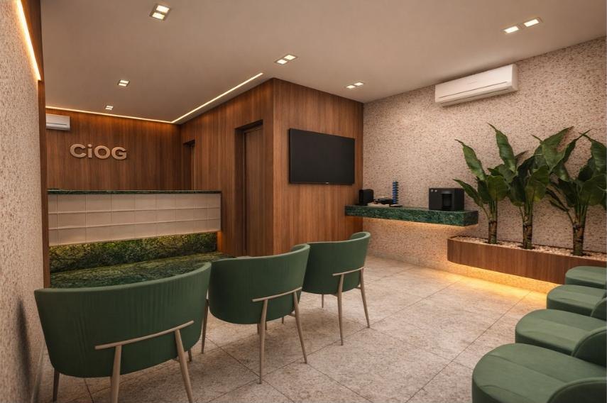 Recepção da clínica odontológica CIOG, com marcenaria amadeirada e poltronas verdes